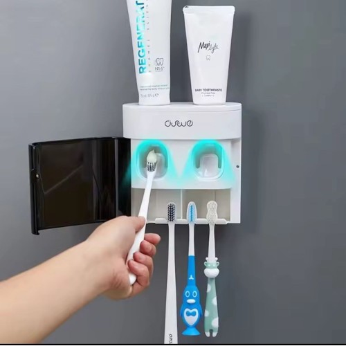 Wall-Mounted Automatic Toothpaste Dispenser Wall-Mounted Automatic Toothpaste Dispenser